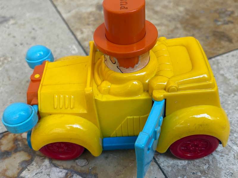 Vintage Tomy push and go car + ring a ding fuel pump 1985