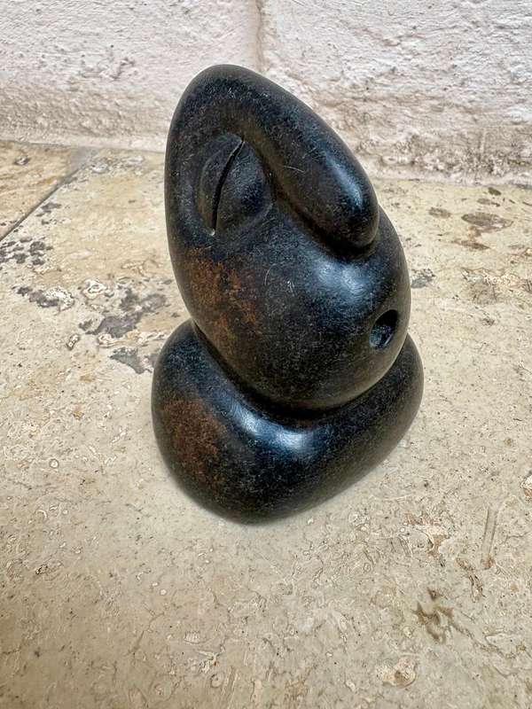 Shona stone sculpture by Fanizani Akuda whistling head Zimbabwe international known abstract Africa