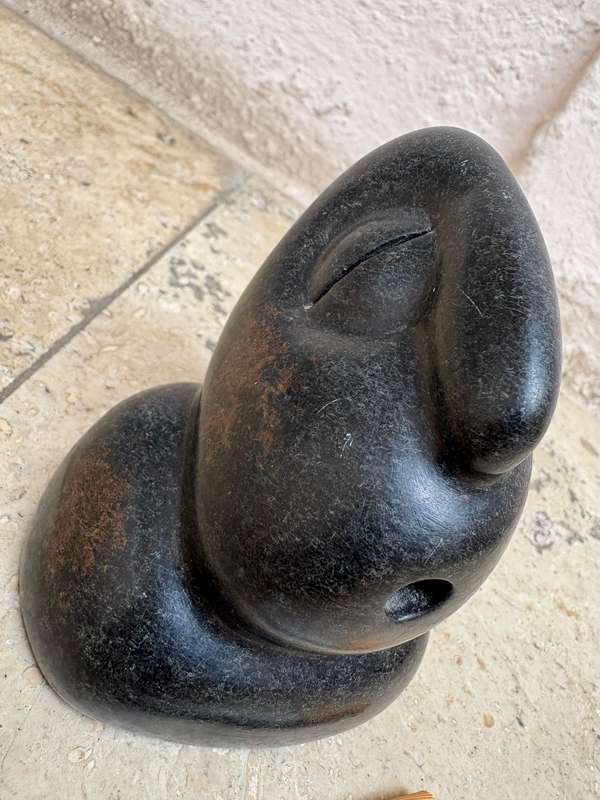 Shona stone sculpture by Fanizani Akuda whistling head Zimbabwe international known abstract Africa