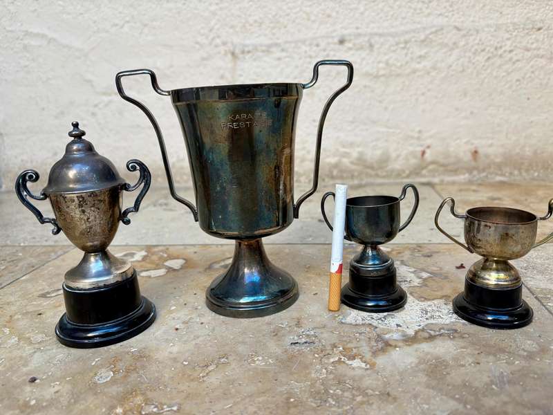 Vintage trophy medium with 3 small blank trophies epns