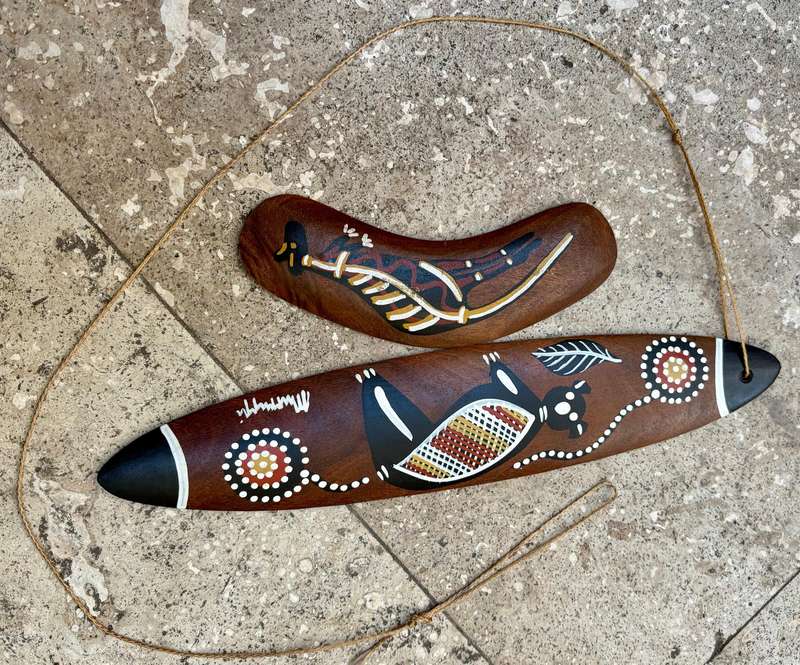 Vintage traditional hunting boomerang and bullroarer traditional aboriginal pair