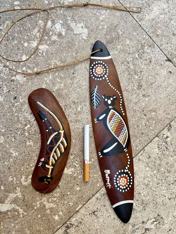 Vintage traditional hunting boomerang and bullroarer traditional aboriginal pair