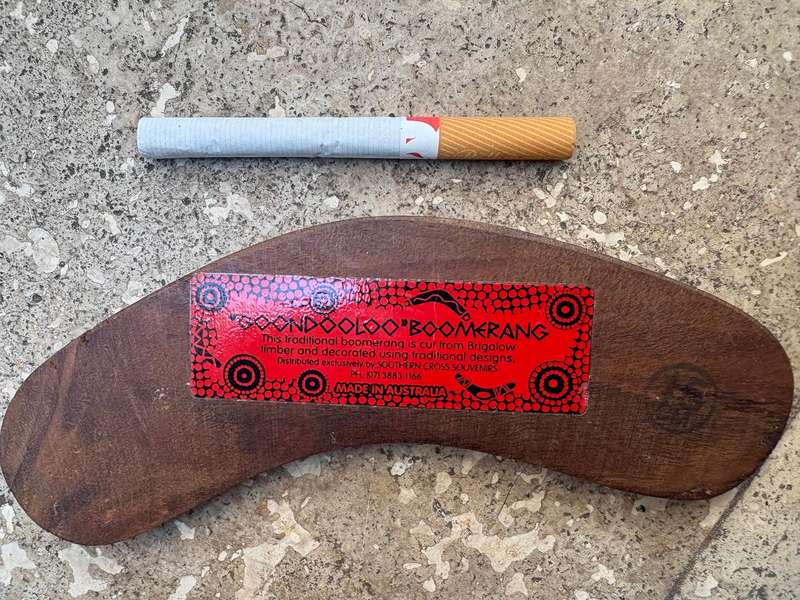 Vintage traditional hunting boomerang and bullroarer traditional aboriginal pair