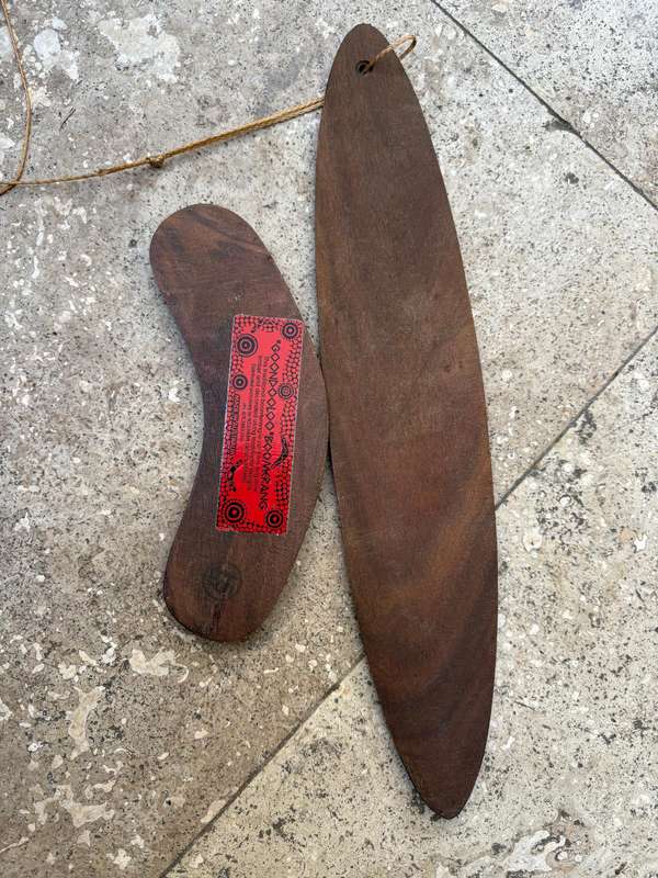 Vintage traditional hunting boomerang and bullroarer traditional aboriginal pair