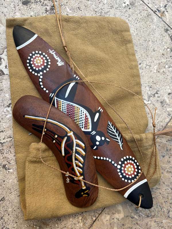Vintage traditional hunting boomerang and bullroarer traditional aboriginal pair