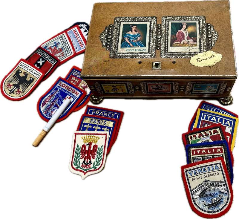 Stamp collector footed tin box with 25 travel badge lot Europe badges