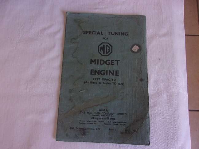 Collection of vintage MG car memorabilia