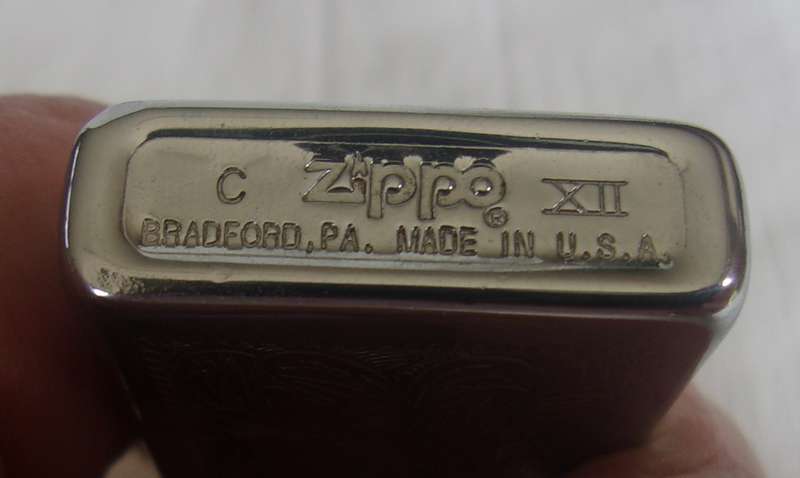 Vintage chrome Zippo lighter - floral design