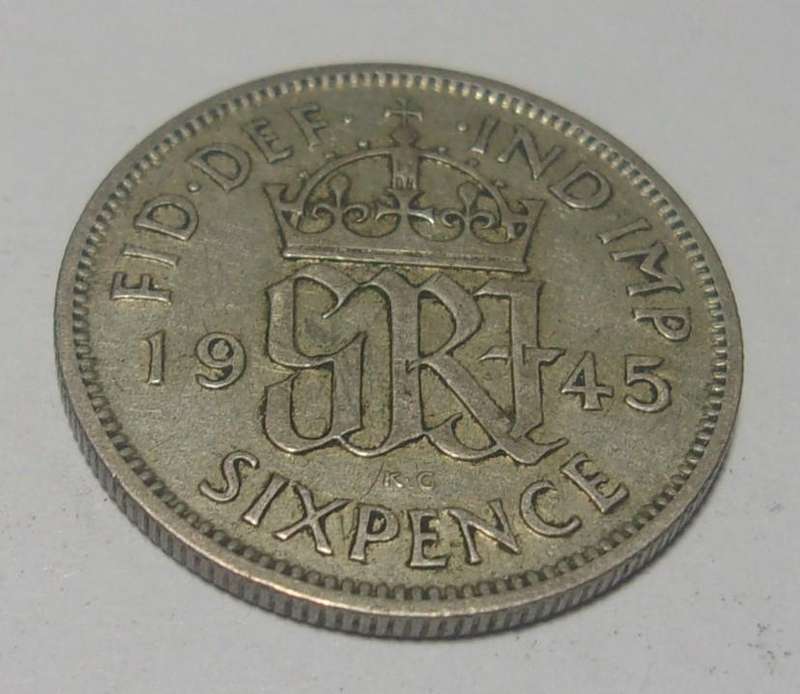 1945 silver British 6 Pence coin