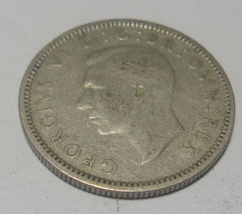 1945 silver British 6 Pence coin