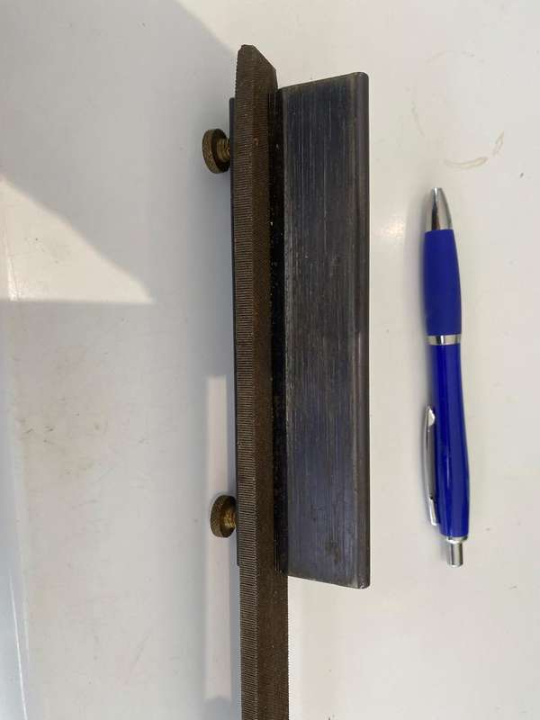 Veritas Jig is for preparing your scraper at 90 degrees before sharpening it with a burnisher