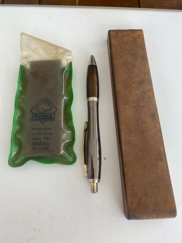 Puma Pocket Arkansas Oilstone plus Pocket Lapping Strop.