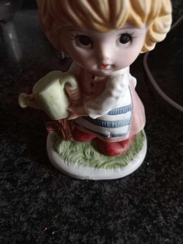 VINTAGE ORNAMENTAL GIRL WITH WATERING CAN