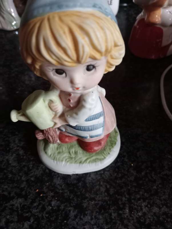 VINTAGE ORNAMENTAL GIRL WITH WATERING CAN