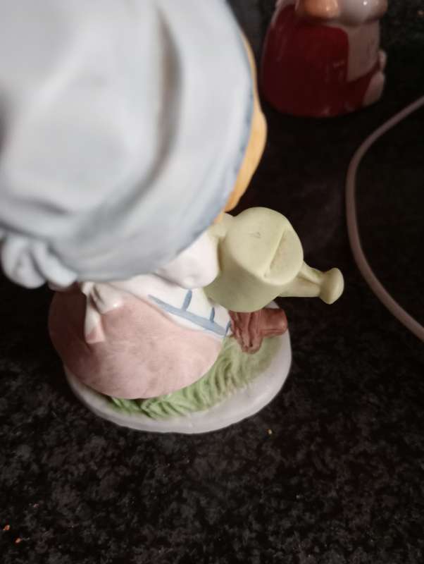 VINTAGE ORNAMENTAL GIRL WITH WATERING CAN