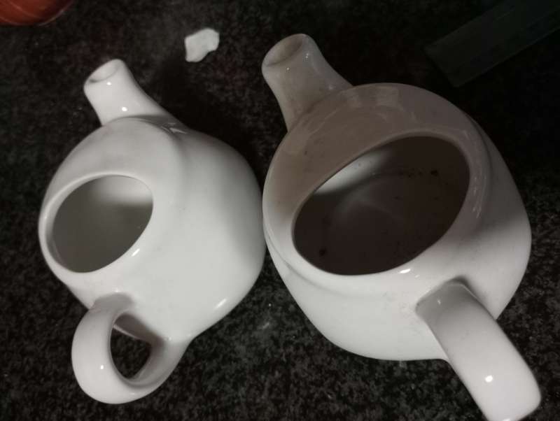 2 VINTAGE ONEIDA MILK JUGS