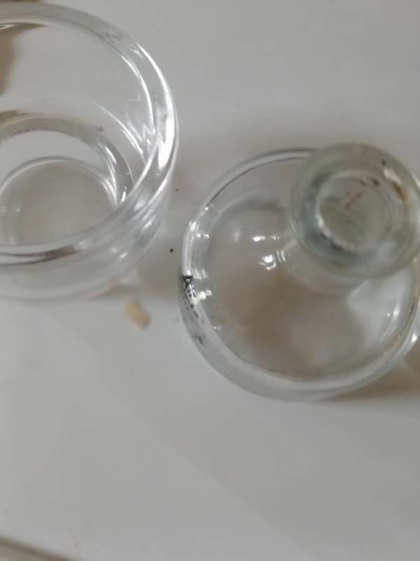 2 SMALL GLASS HOLDERS