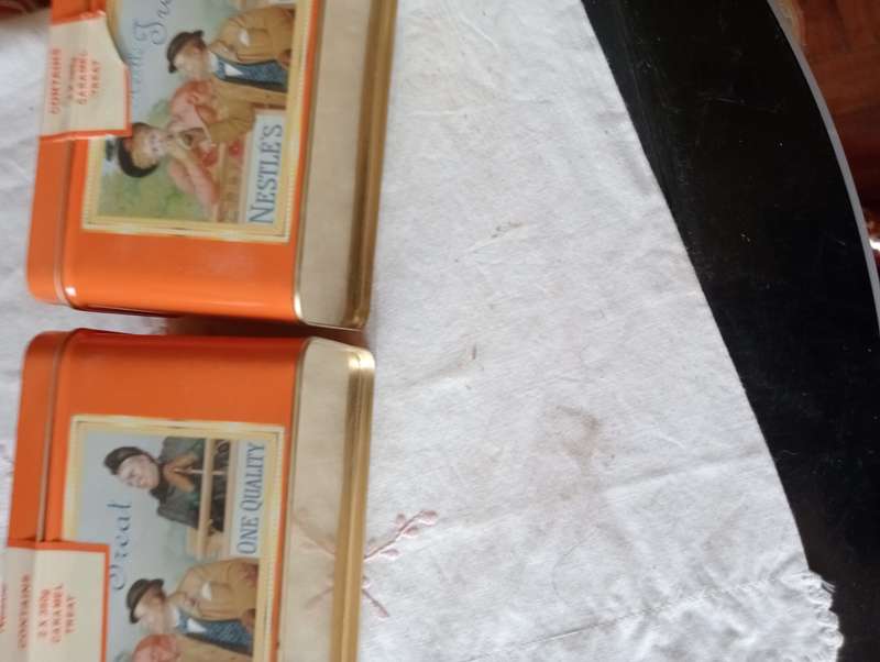 2 VINTAGE NESTLE TINS