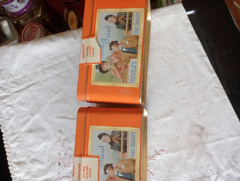 2 VINTAGE NESTLE TINS