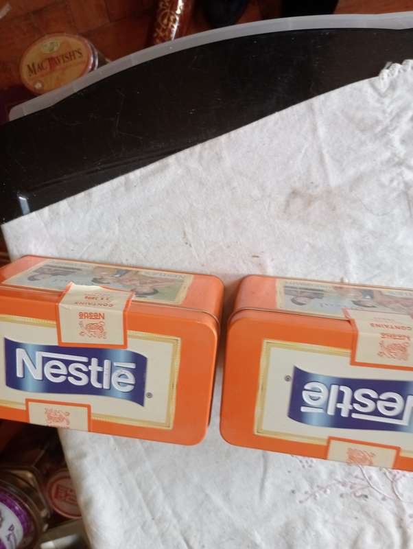 2 VINTAGE NESTLE TINS