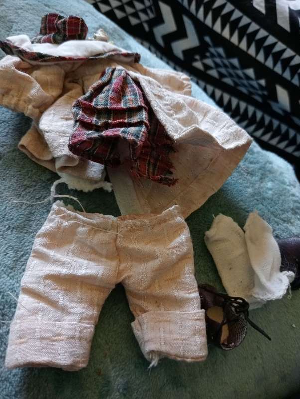2 SMALL ANTIQUE BABY DOLLS ON SWING
