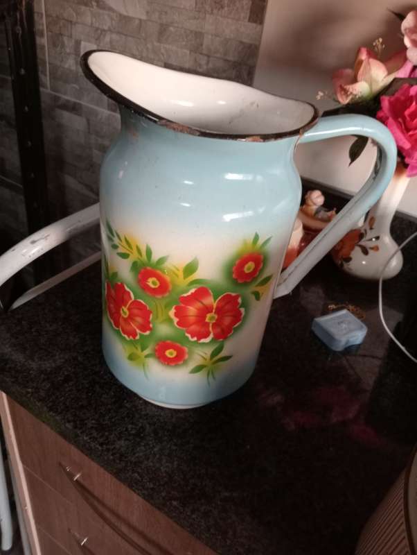 ANTIQUE ENAMEL PITCHER