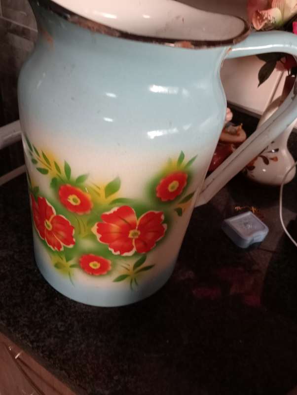 ANTIQUE ENAMEL PITCHER