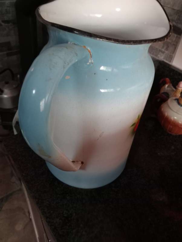 ANTIQUE ENAMEL PITCHER