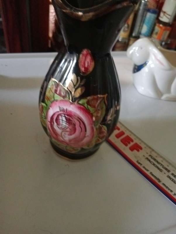 ANTIQUE BLACK PORCELAIN VASE
