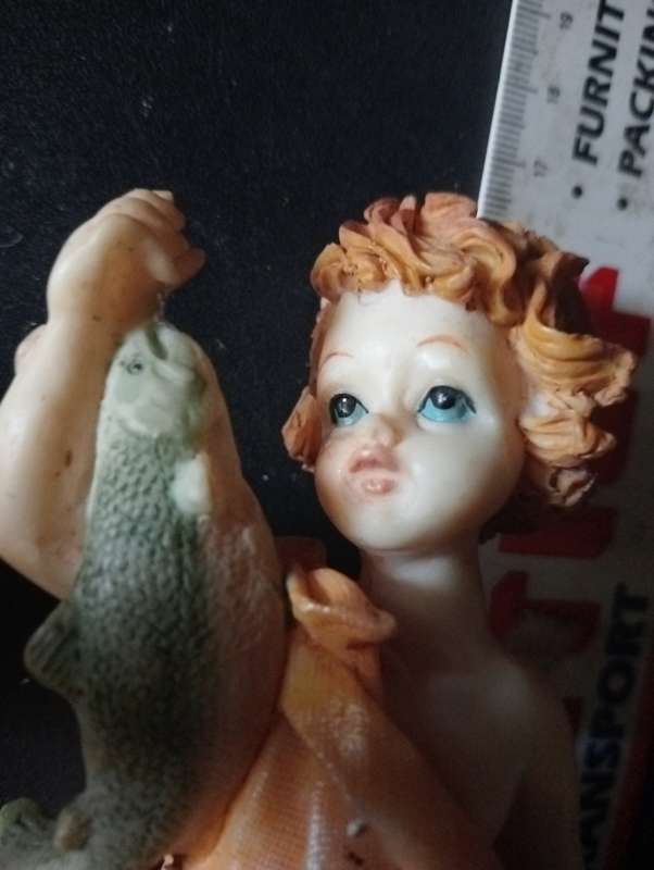 ANTIQUE PORCELAIN GIRL ORNAMENT WITH FISH