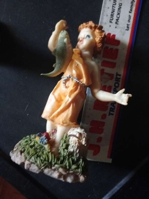 ANTIQUE PORCELAIN GIRL ORNAMENT WITH FISH