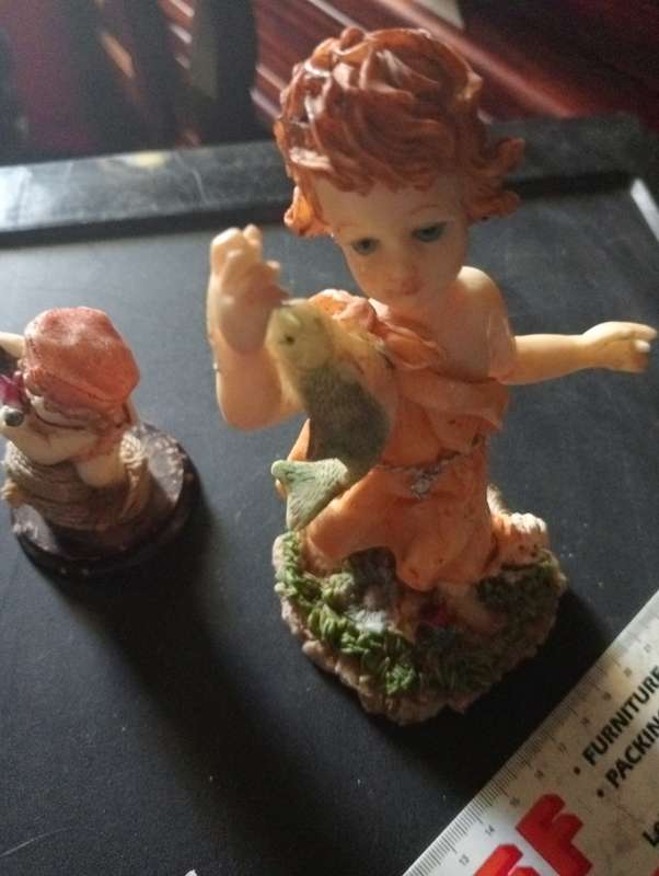 ANTIQUE PORCELAIN GIRL ORNAMENT WITH FISH