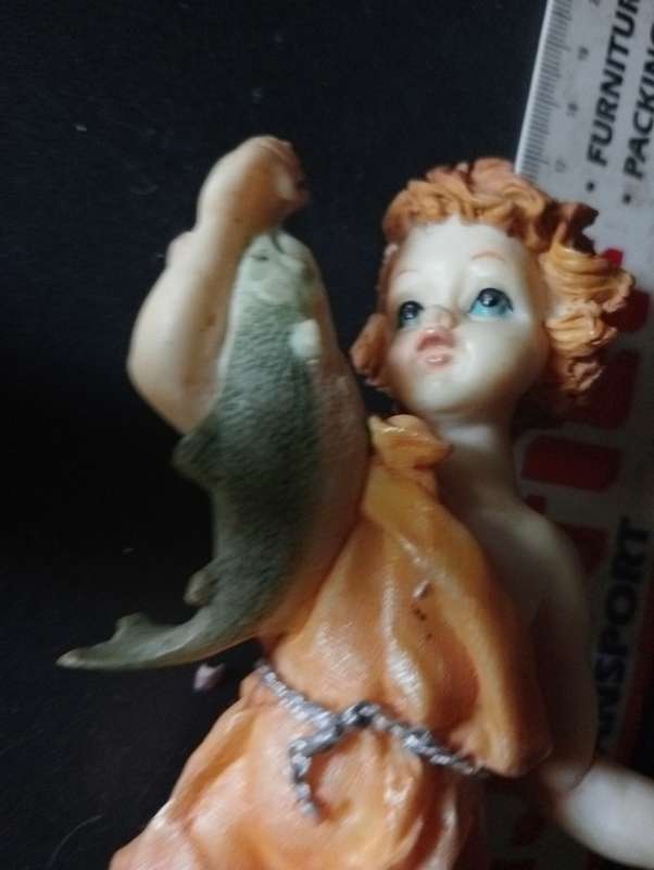 ANTIQUE PORCELAIN GIRL ORNAMENT WITH FISH