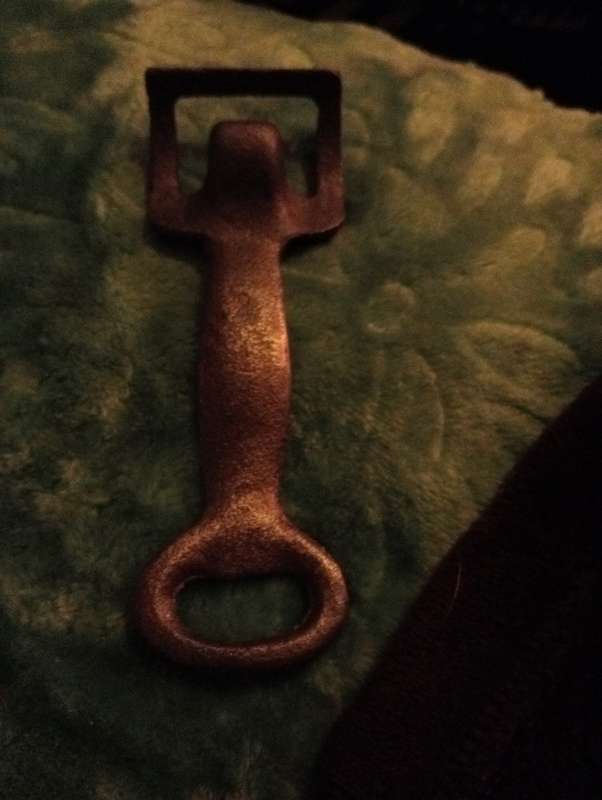 VINTAGE CAST IRON BOTTLE OPENER