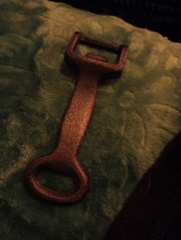 VINTAGE CAST IRON BOTTLE OPENER