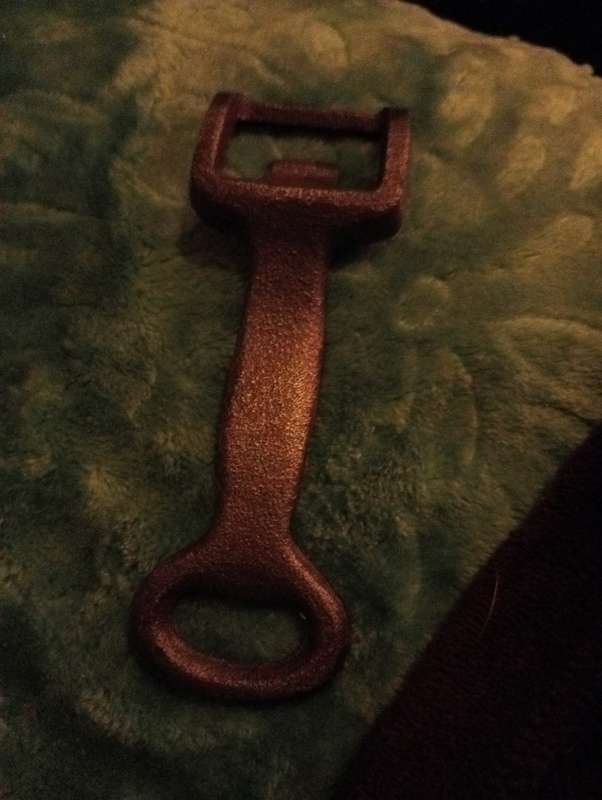 VINTAGE CAST IRON BOTTLE OPENER