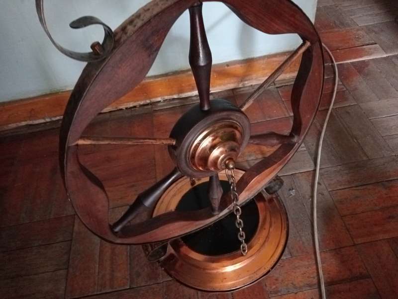 ANTIQUE  INTERESTING HANDMADE WOOD  WHEEL WITH COPPER TRIMMINGS AND COPPER  CHAINS STAND