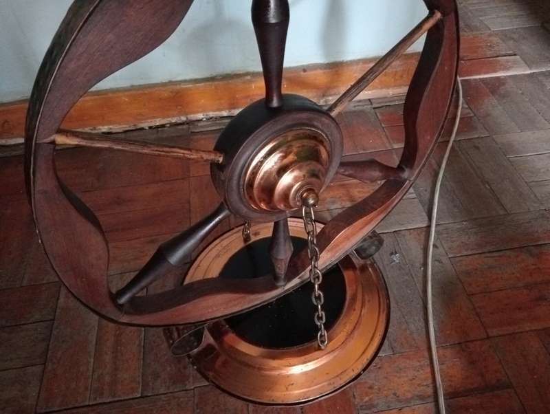 ANTIQUE  INTERESTING HANDMADE WOOD  WHEEL WITH COPPER TRIMMINGS AND COPPER  CHAINS STAND