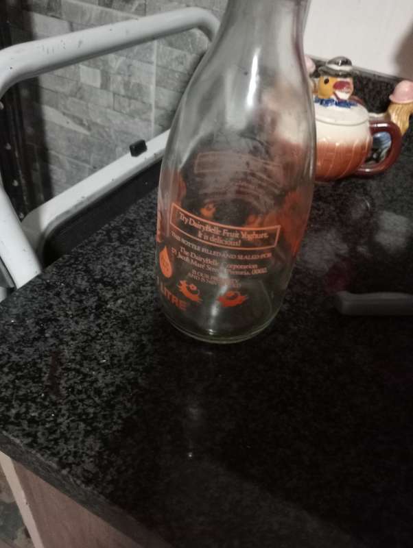 VINTAGE 1 LITER DAIRYBELL MILK BOTTLE
