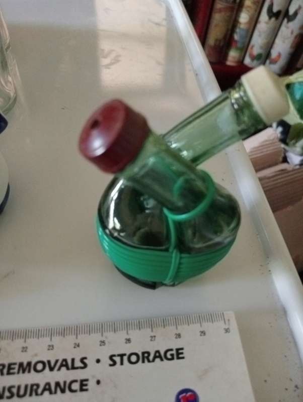 VINTAGE GREEN GLASS SALT AND PEPPER SET