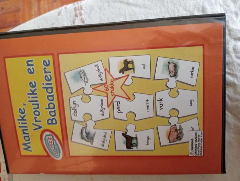 VINTAGE 20 PIECE MANLIKE EN VROULIKE DIERE PUZZLE
