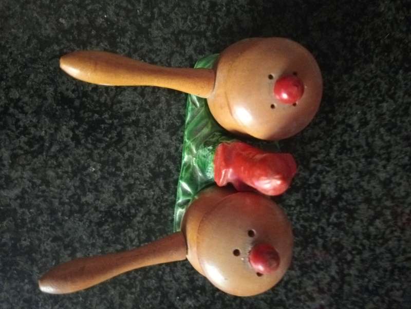 Vintage salt and pepper set in green tray