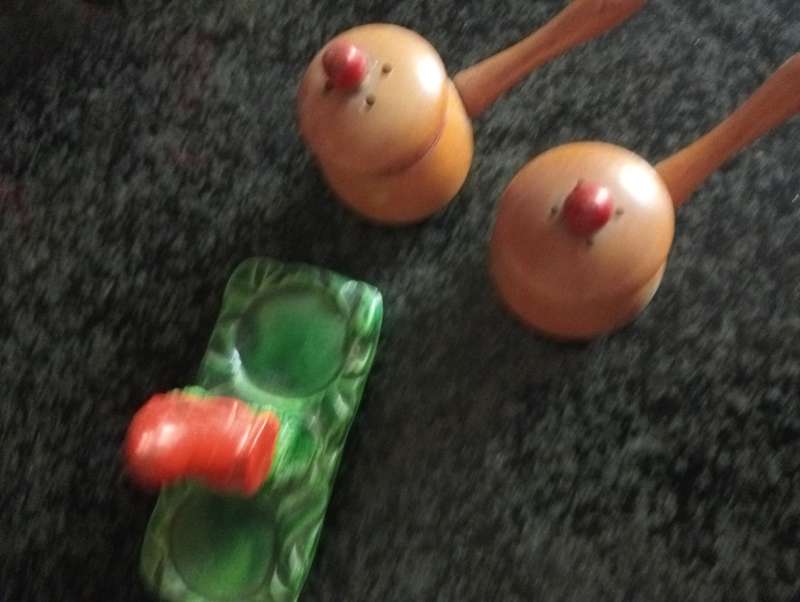 Vintage salt and pepper set in green tray