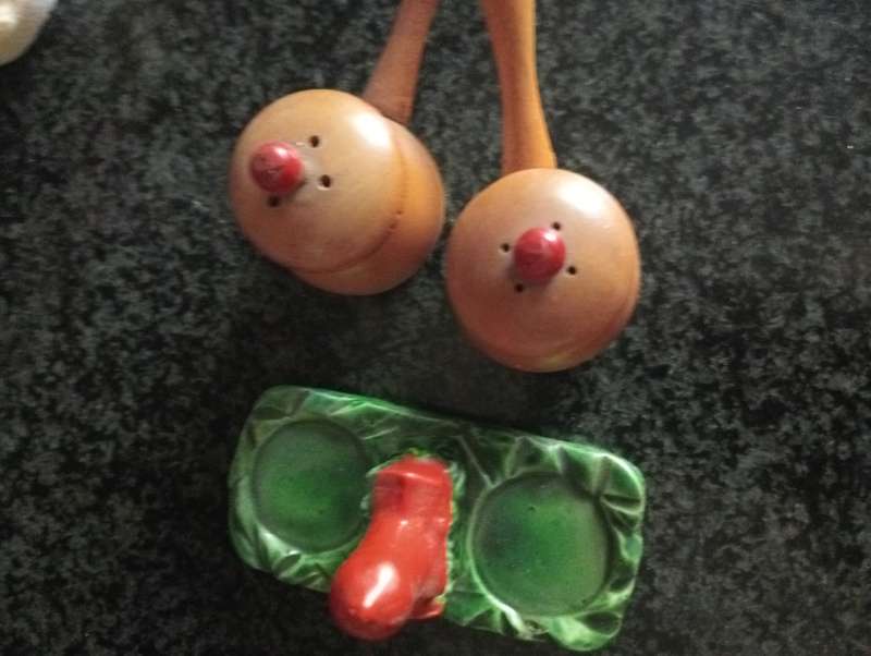 Vintage salt and pepper set in green tray