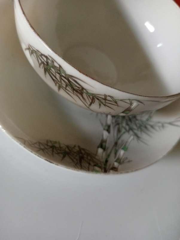 VINTAGE COLLECTABLE BLACK AND WHITE CUP AND SAUCER
