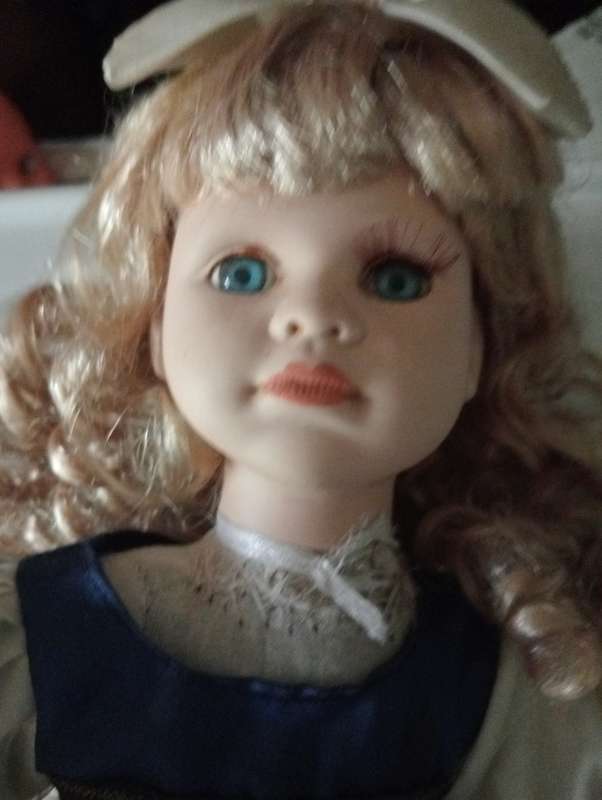 VINTAGE PORCELAIN DOLL