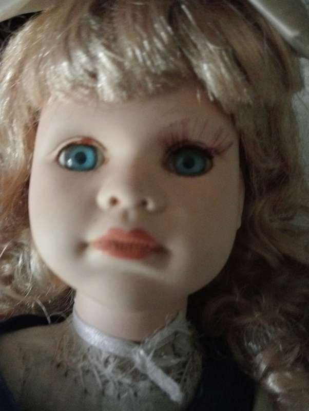 VINTAGE PORCELAIN DOLL