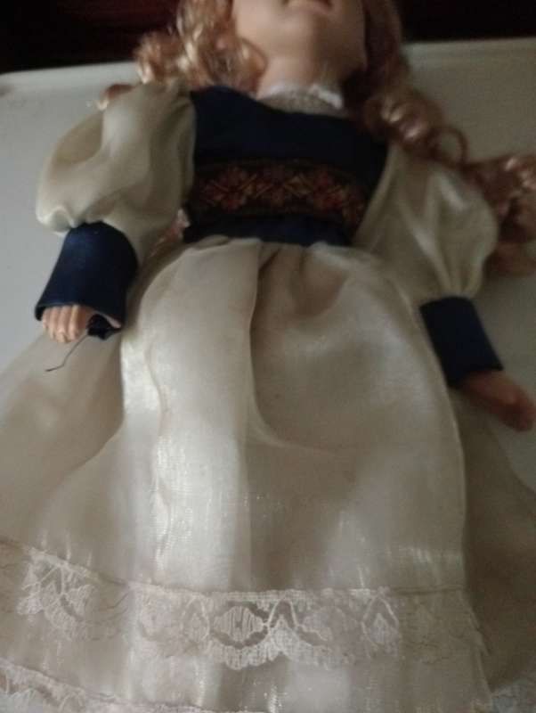VINTAGE PORCELAIN DOLL