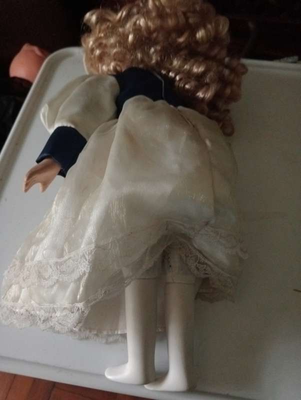 VINTAGE PORCELAIN DOLL
