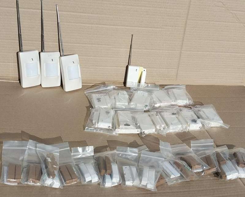 Home GSM alarm system with wireless sensors and wired switches